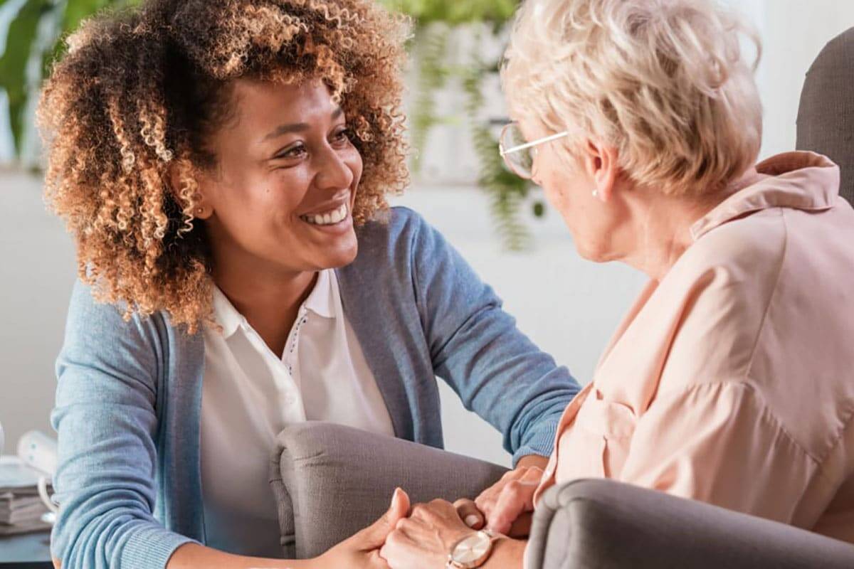 A Woman Holding A Woman'S Hand